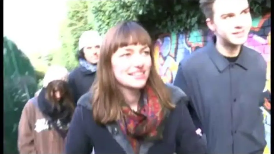 Still from a BBC London news report filmed in Nunhead, showing people being interviewed in the street.